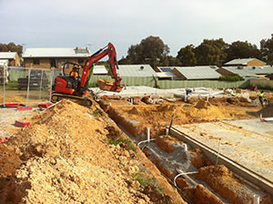 our plumbers working on a commercial plumbing job